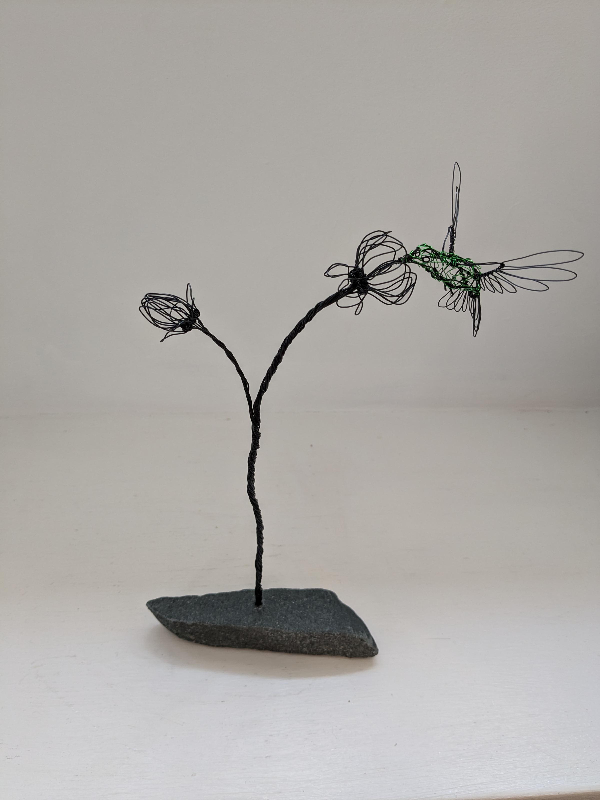 Humming on Double Flower Stem